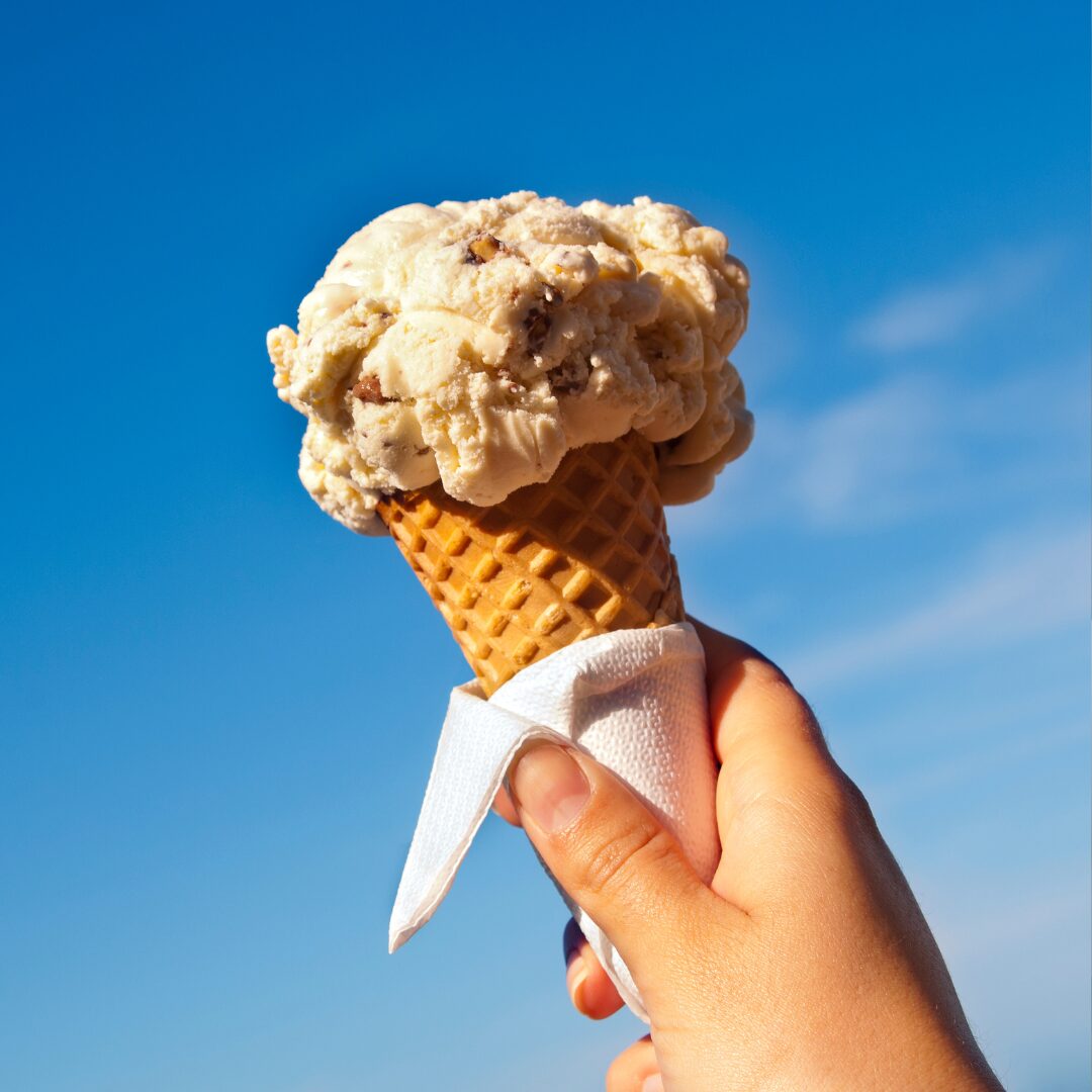 Hairdresser styling a client’s hair at New Palace Hair & Beauty Salon in Middy's Mall.